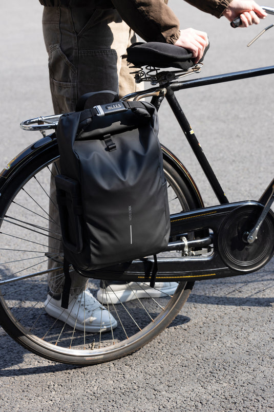 Urban water-resistant bike backpack by XD Design with multiple compartments and adjustable straps for cycling and travel.