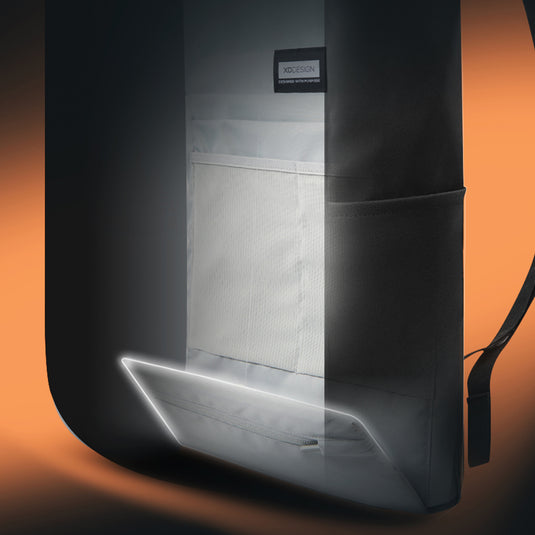 Urban water-resistant bike backpack by XD Design with multiple compartments and reflective details for cycling safety.