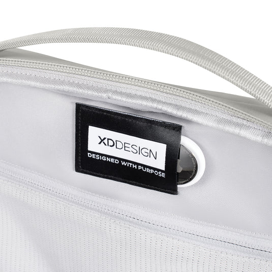 Light gray XD Design Bobby Air backpack with multiple compartments and padded straps, designed for comfortable travel and everyday use.