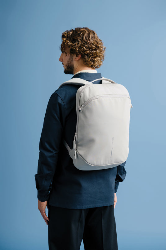 XD Design Bobby Air Backpack in black, showcasing padded shoulder straps, front pocket, and sleek travel bag design.
