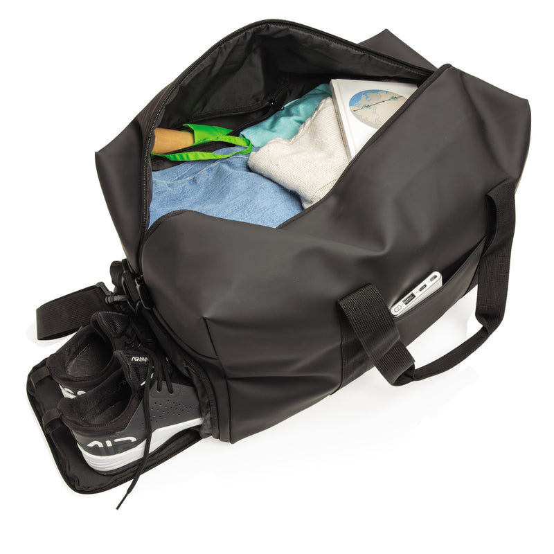 Load image into Gallery viewer, Smooth PU weekend duffle bag from XD Collection, showcasing a sleek, durable travel bag with sturdy handles and spacious interior.
