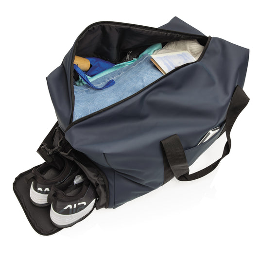 Smooth PU weekend duffle bag from XD Collection, featuring a sleek design with sturdy handles and a spacious interior.