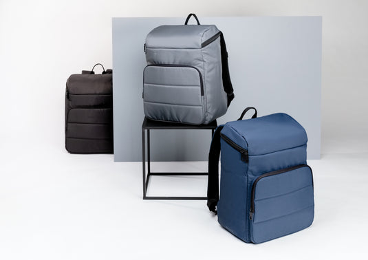 XD Xclusive Impact AWARE™ RPET cooler backpack for outdoor use, with insulated main compartment and adjustable straps.