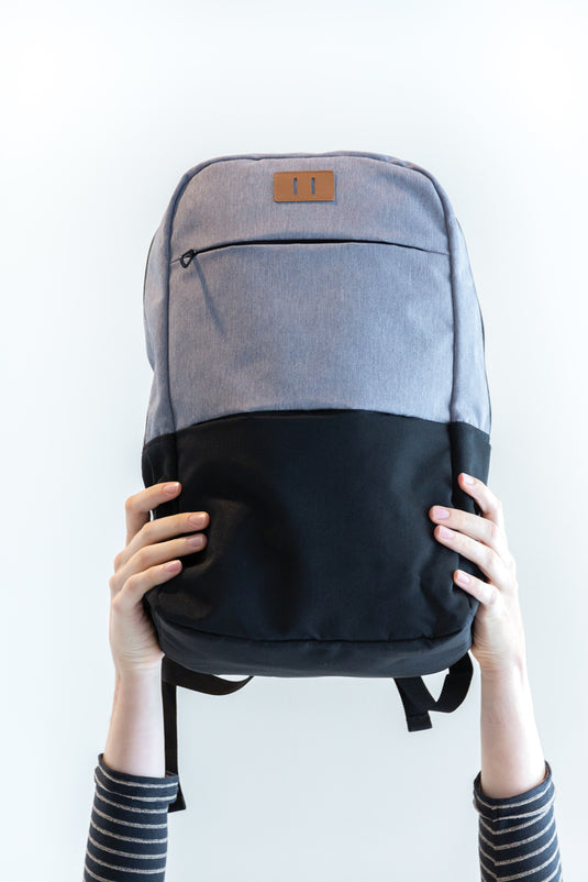 Modern 15.6-inch PVC-free USB and RFID laptop backpack from XD Collection, featuring multiple compartments and padded straps.