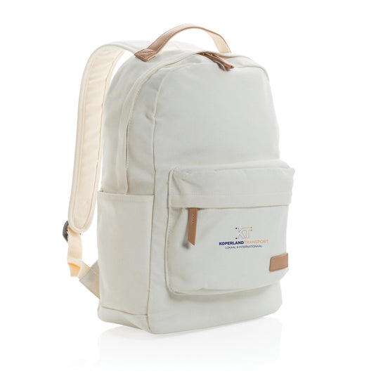 16 oz recycled canvas backpack from XD Collection with adjustable straps and multiple compartments, placed on a wooden surface.