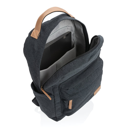 16 oz recycled canvas backpack from XD Collection, stylish eco-friendly bag with adjustable straps and multiple compartments.