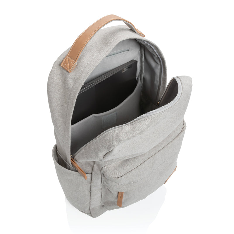 Load image into Gallery viewer, 16 oz recycled canvas backpack from XD Collection featuring multiple compartments and adjustable straps, ideal for travel and daily use.
