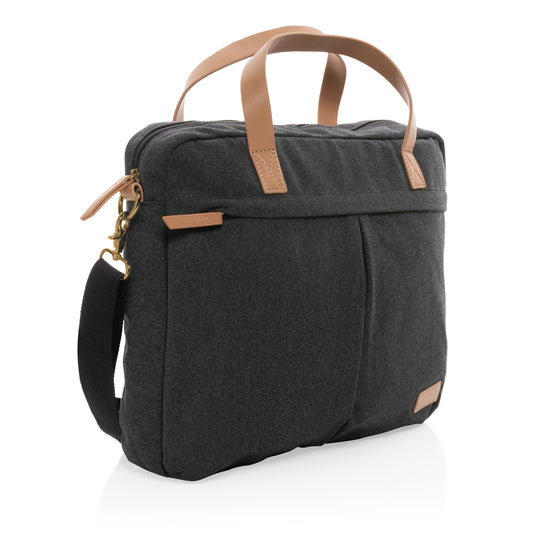 16 oz recycled canvas laptop bag from XD Collection with adjustable strap and multiple compartments.