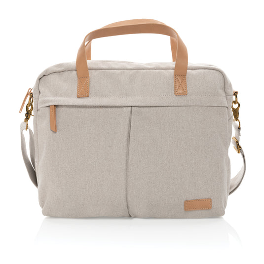 16 oz recycled canvas laptop bag from XD Collection with adjustable strap and multiple compartments, designed for eco-friendly travel.