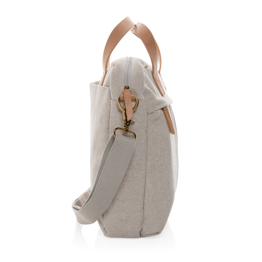 Recycled canvas laptop bag by XD Collection, 16 oz. durable, eco-friendly travel bag with adjustable strap and multiple compartments.
