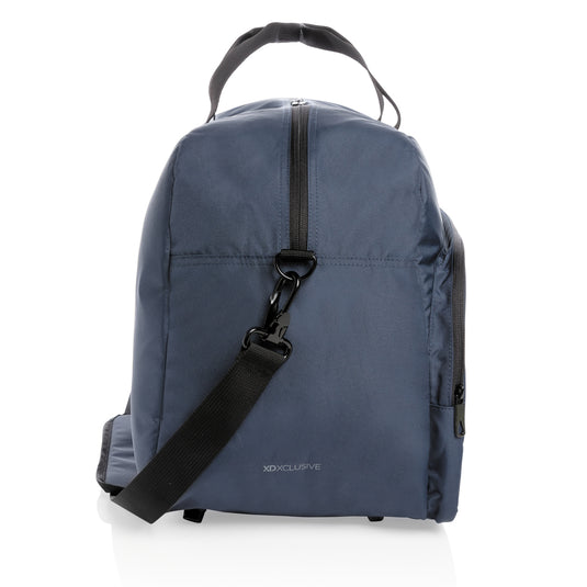 Impact AWARE™ RPET weekend duffel bag by XD Xclusive, showing a spacious eco-friendly travel bag with handles and zipper closure.
