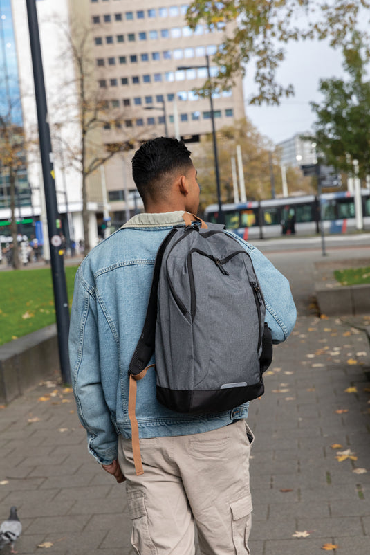 Impact AWARE™ Urban outdoor backpack by XD Collection, black nylon bag with multiple compartments and padded shoulder straps.