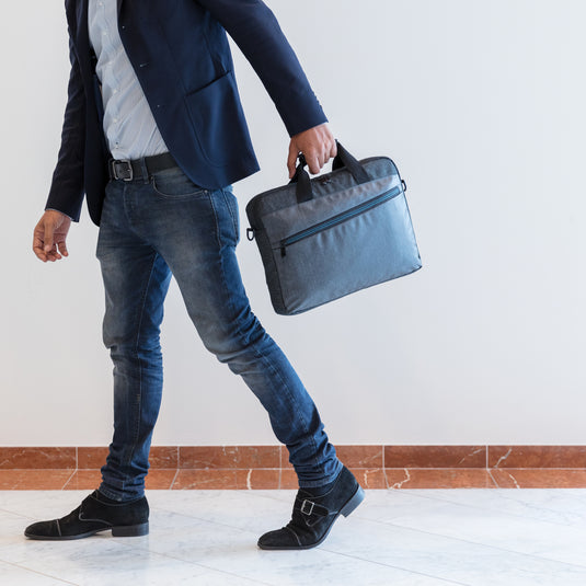 Dark gray 900D PVC-free laptop bag from XD Collection with padded shoulder strap and multiple compartments.