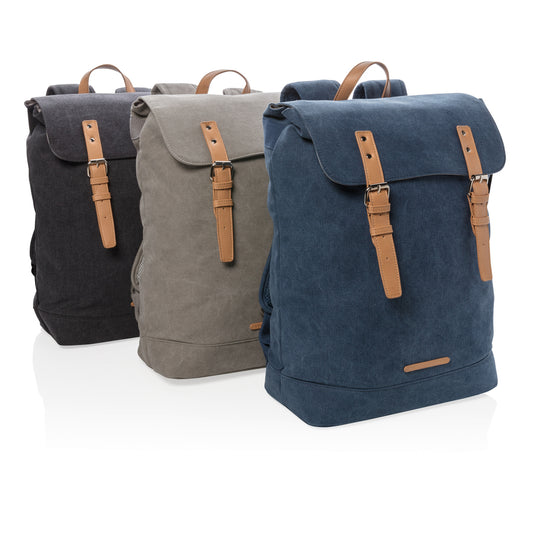 PVC-free Canvas laptop backpack from XD Collection in gray with adjustable straps and multiple compartments for travel and daily use.