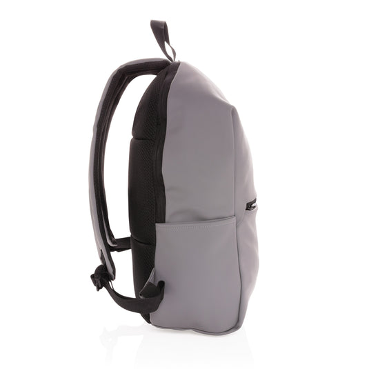 XD Collection smooth PU 15.6-inch laptop backpack with multiple compartments and padded shoulder straps for comfortable carrying.