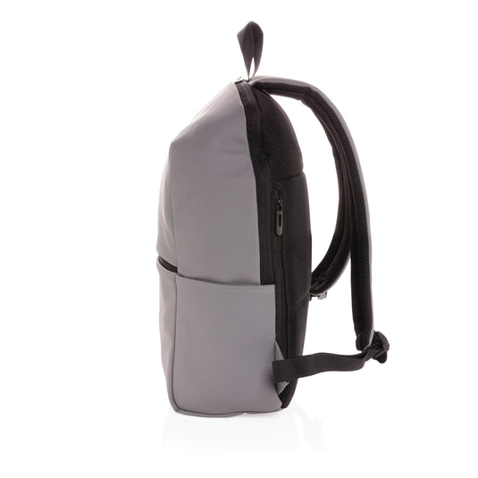 Smooth black XD Collection 15.6-inch laptop backpack with multiple compartments and padded shoulder straps for comfortable travel.