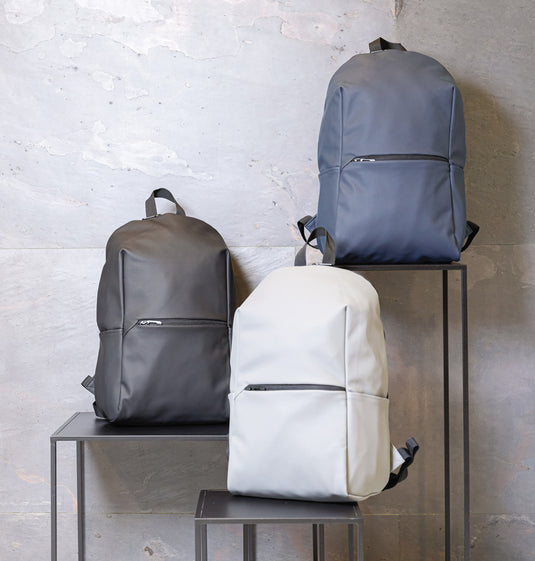 Smooth PU 15.6-inch laptop backpack from XD Collection, stylish bag with padded compartments for travel and daily use.