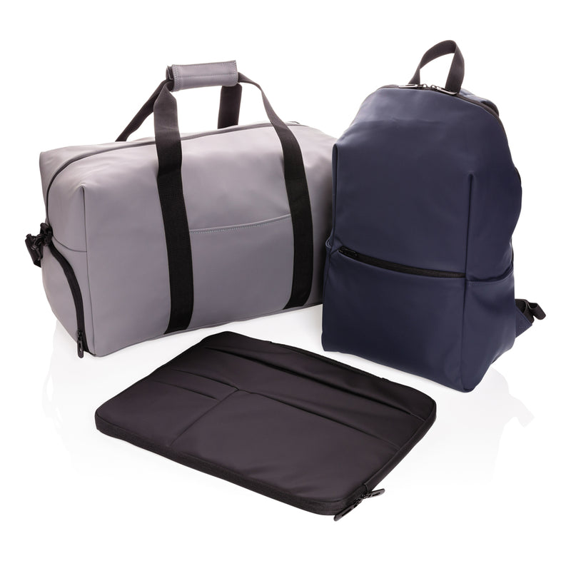 Load image into Gallery viewer, XD Collection smooth PU 15.6-inch laptop backpack with multiple compartments and padded straps for comfortable carrying.
