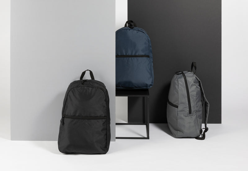 Load image into Gallery viewer, Lightweight Impact AWARE™ RPET backpack from XD Collection featuring multiple compartments and adjustable straps.

