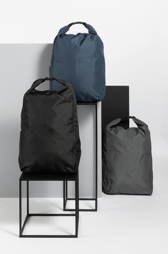 Lightweight RPET rolltop backpack from XD Collection's Impact AWARE™ series, designed for bags and travel with a sleek, modern look.