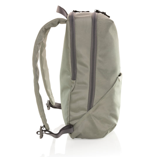 XD Xclusive Impact AWARE™ 1200D 15.6-inch modern laptop backpack with multiple compartments and padded shoulder straps.