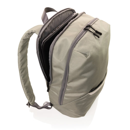 XD Xclusive Impact AWARE™ 1200D 15.6-inch modern laptop backpack with padded straps and multiple compartments.