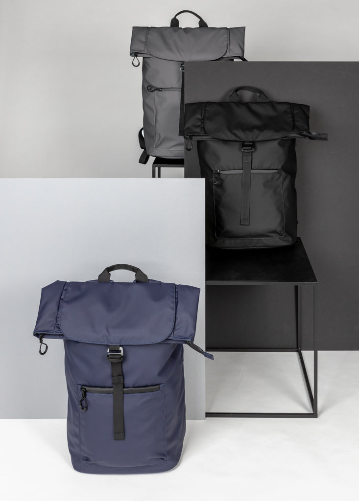 Load image into Gallery viewer, XD Collection Impact AWARE™ RPET water-resistant laptop backpack in black with multiple compartments and padded shoulder straps.
