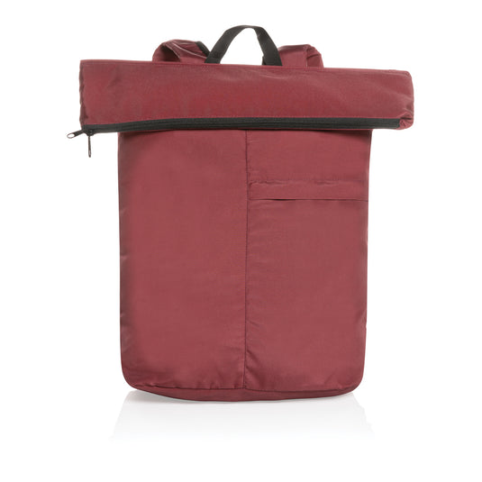 Lightweight Dillon AWARE™ RPET foldable backpack by XD Collection, showing its compact, foldable design and green color.