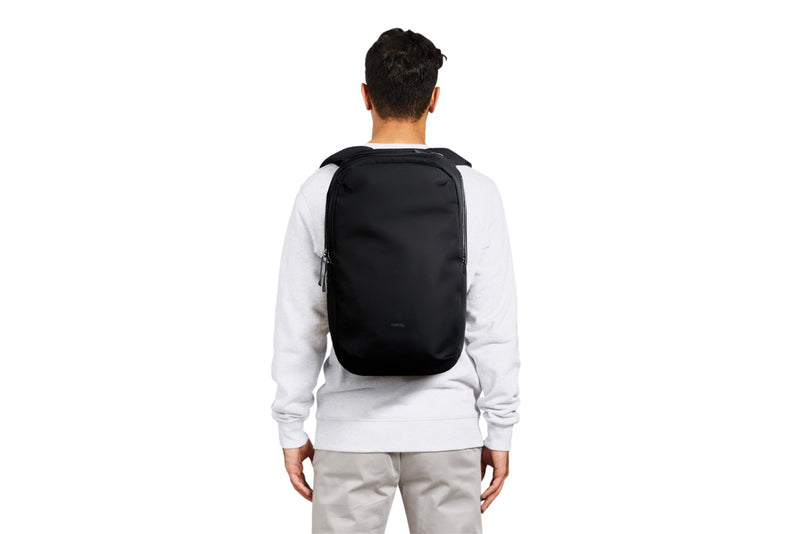 Load image into Gallery viewer, Bellroy Via Backpack in black with multiple compartments, padded shoulder straps, and sleek design for travel and everyday use.
