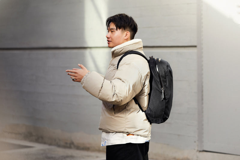 Load image into Gallery viewer, Bellroy Via Backpack in black with multiple compartments, padded shoulder straps, and sleek design for everyday travel and work.
