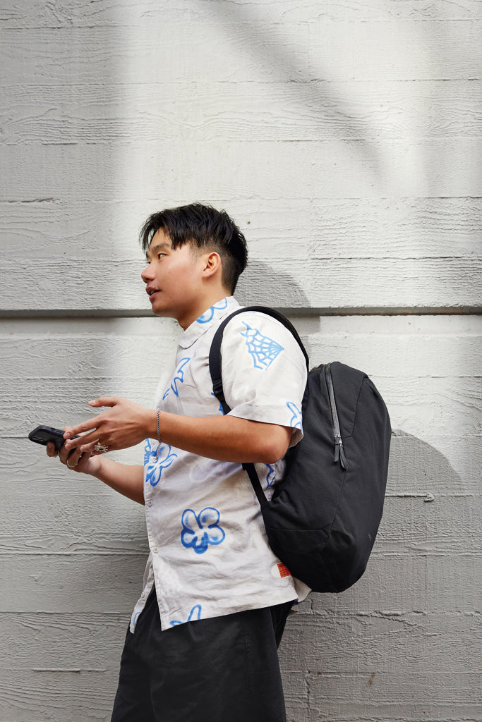 Load image into Gallery viewer, Bellroy Via Backpack from Bags &amp; Travel collection, showing a sleek, gray leather and fabric backpack with multiple compartments.

