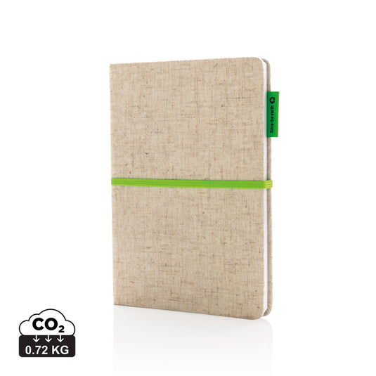 A5 jute notebook from XD Collection with a textured jute cover and black elastic band closure, ideal for writing and note-taking.