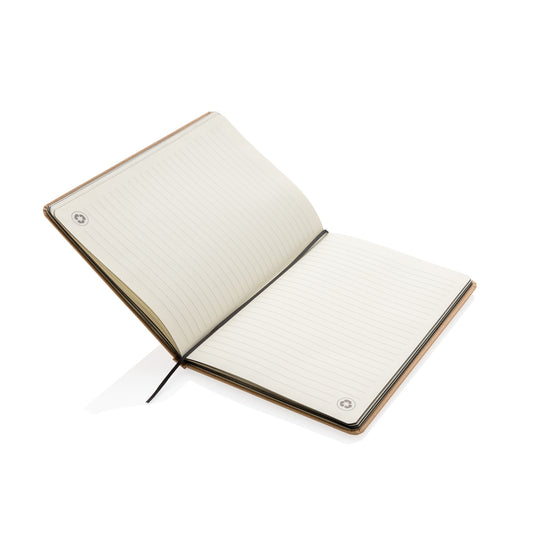 A5 kraft notebook from XD Collection with a rustic cover, open to show blank cream pages inside for note-taking or journaling.