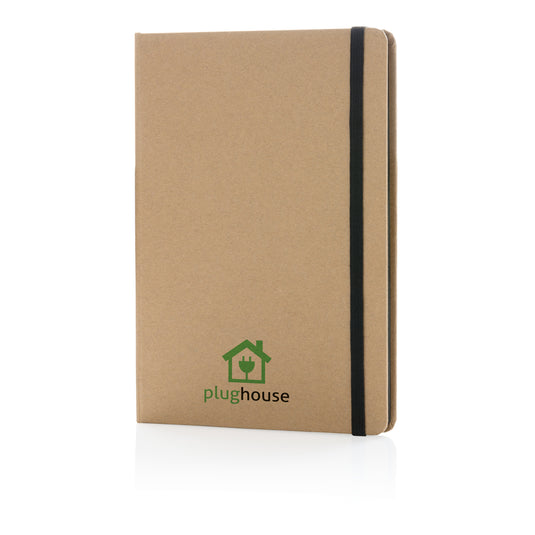A5 kraft notebook from XD Collection with a rustic cover, open to reveal lined pages for writing or note-taking.
