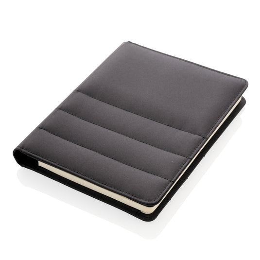 Impact AWARE™ RPET A5 notebook by XD Xclusive featuring a durable, eco-friendly cover and lined pages for note-taking.