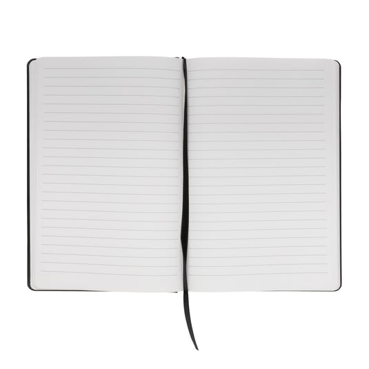 A5 Impact stone paper hardcover notebook from XD Collection in black with embossed design, open to show lined pages.