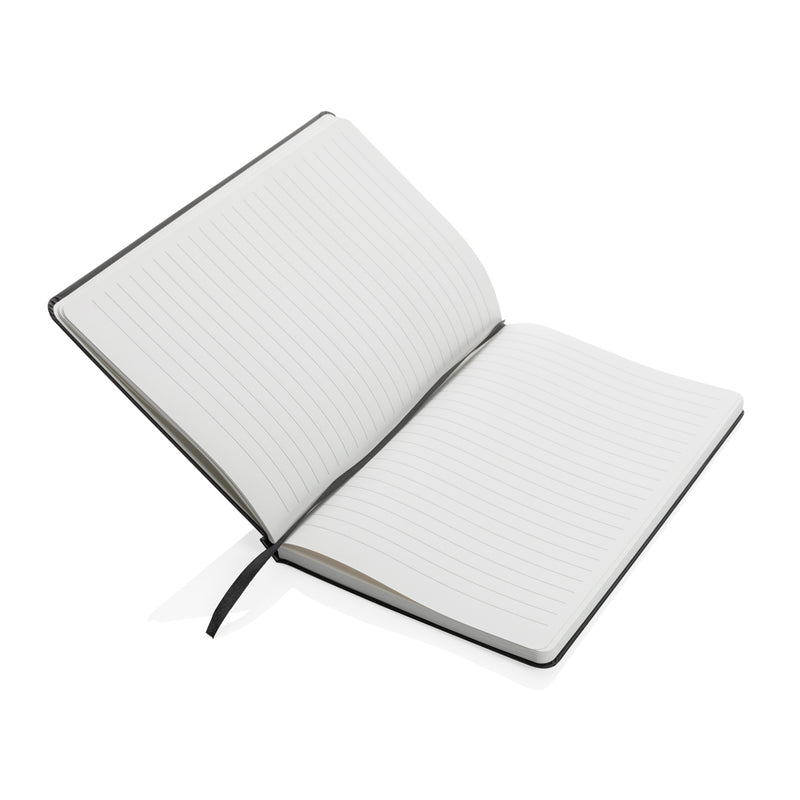 Load image into Gallery viewer, A5 Impact stone paper hardcover notebook from XD Collection with a sleek black cover and visible spiral binding.
