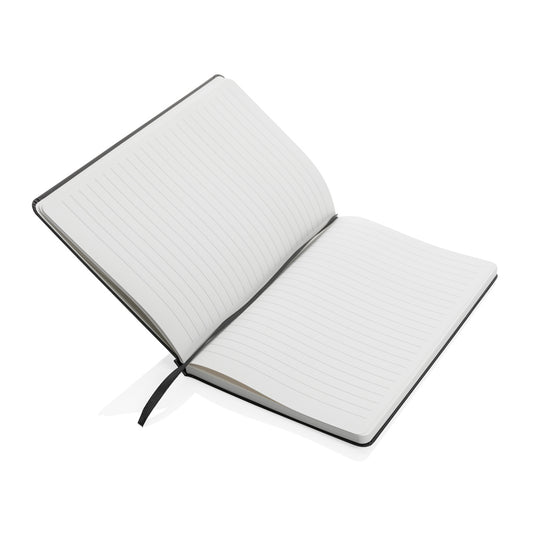 A5 Impact stone paper hardcover notebook from XD Collection with a sleek black cover and visible spiral binding.