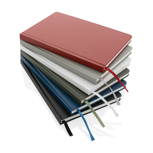 A5 Impact stone paper hardcover notebook from XD Collection with a sleek black cover and rounded corners.