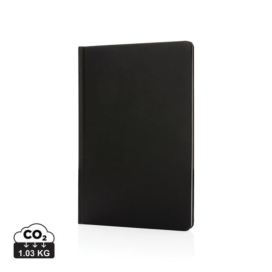 A5 Impact stone paper hardcover notebook from XD Collection with a sleek black cover and elastic closure.