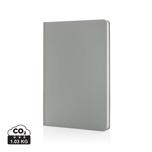 A5 Impact stone paper hardcover notebook from XD Collection with durable cover and blank pages for writing or note-taking.