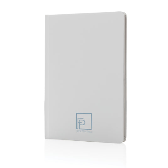 A5 Impact stone paper hardcover notebook by XD Collection, showcasing a sleek black cover and spiral binding, ideal for note-taking.
