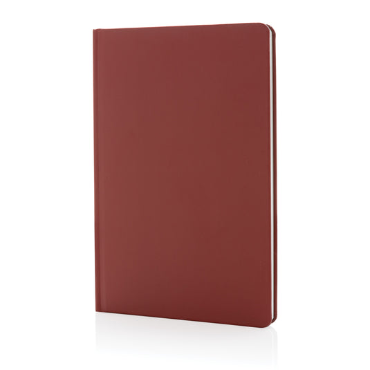 A5 Impact stone paper hardcover notebook by XD Collection with black cover and elastic closure, ideal for writing and note-taking.