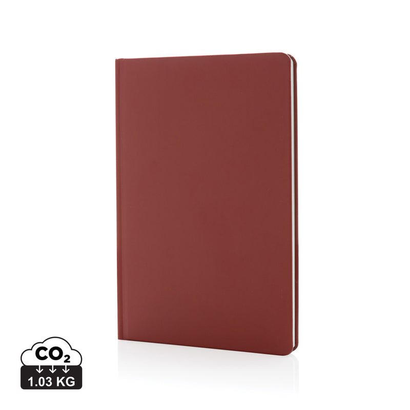 Load image into Gallery viewer, A5 Impact stone paper hardcover notebook from XD Collection with a sleek black cover and visible binding, ideal for note-taking.
