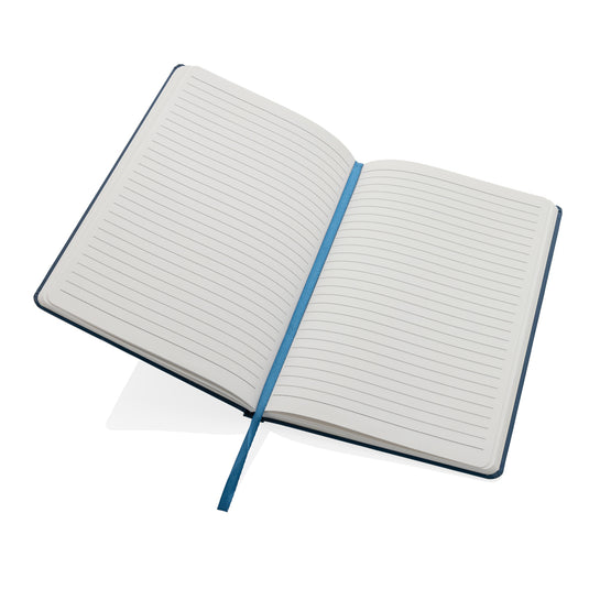 A5 Impact stone paper hardcover notebook from XD Collection, with a sleek black cover and visible binding.