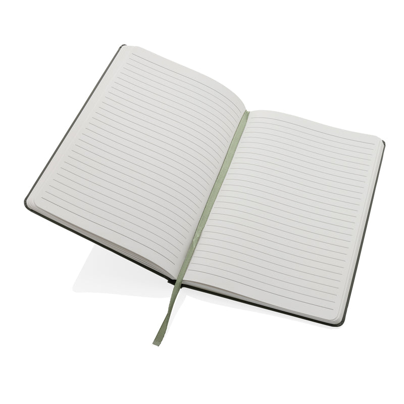 Load image into Gallery viewer, A5 Impact stone paper hardcover notebook by XD Collection, featuring a sleek black design with a sturdy cover and blank pages inside.
