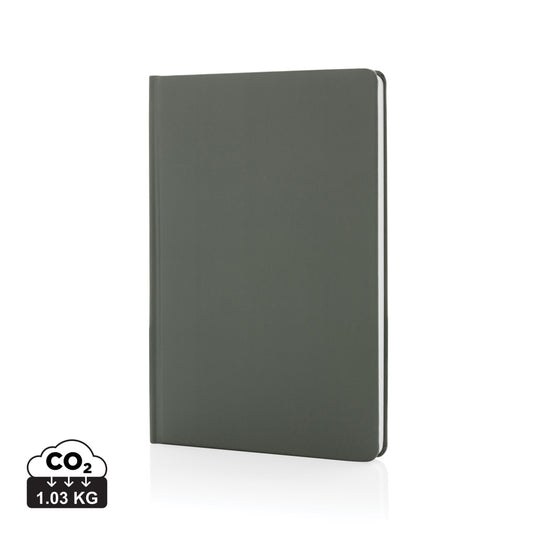 A5 Impact stone paper hardcover notebook from XD Collection with black cover and blank pages, ideal for note-taking and journaling.