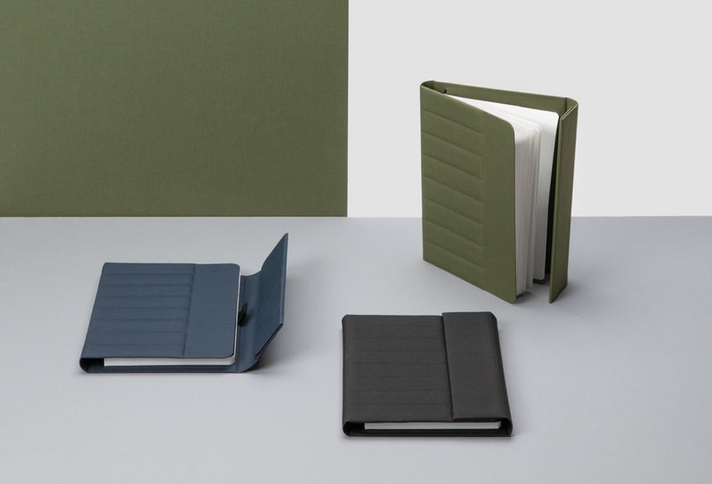 Load image into Gallery viewer, Impact Aware™ A5 notebook by XD Xclusive with magnetic closure, featuring a sleek cover and compact design for note-taking.
