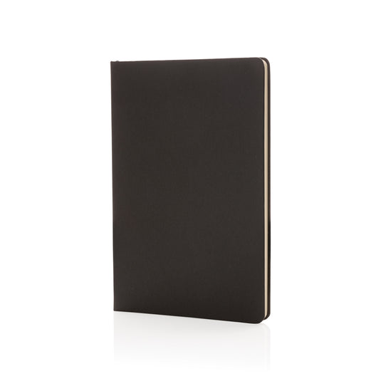 A5 hardcover notebook from XD Collection with a sleek black cover, closed and showing the textured surface.