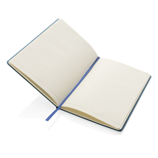 A5 hardcover notebook from XD Collection with a sleek black cover, open to show lined pages inside.
